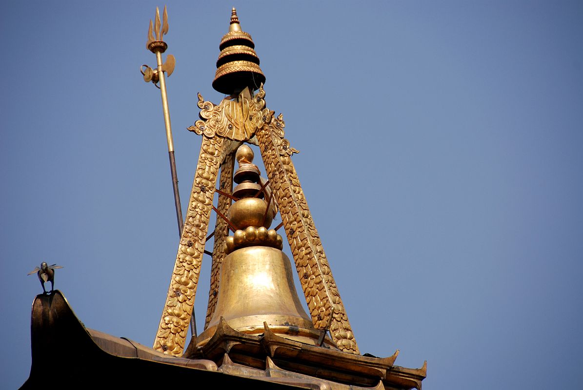 03 Kathmandu Gokarna Mahadev Temple Very Top Has A Trident, Bell, Canopy and Bird 